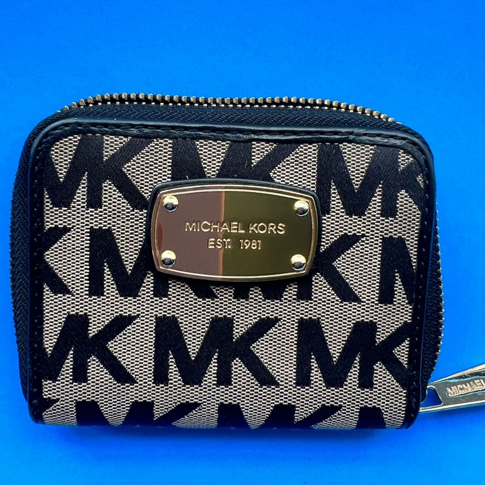 Michael Kors All around Zip wallet.